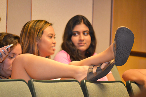 Orientation participants chill as they wait for the next workshop to begin on Thursday morning.